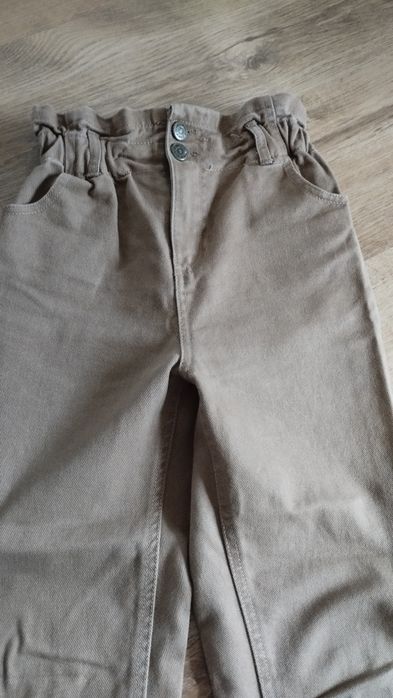 Spodnie jeansy brązowe 140 146 szerokie