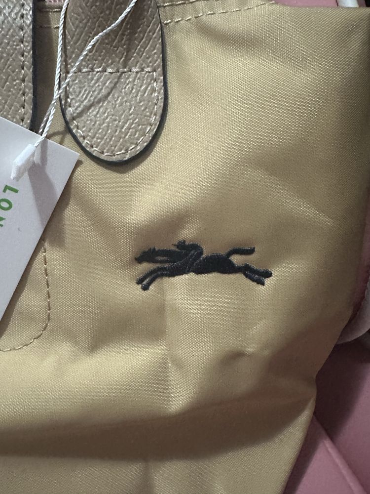 Mala Longchamp creme