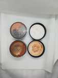 Zestaw kosmetyków - rozświetlaczy sypkich MAC Cosmetics