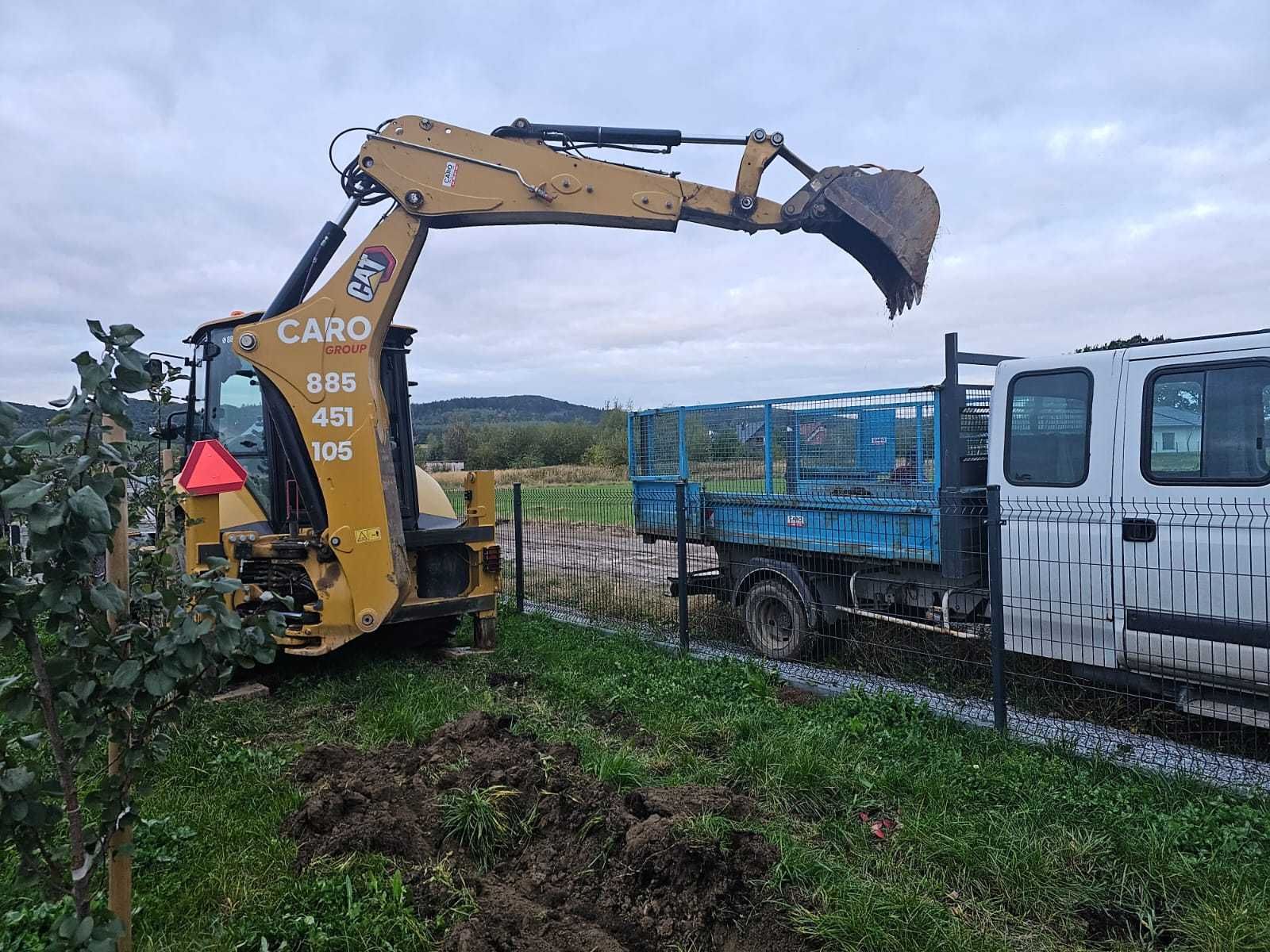 Usługi koparko-ładowarką wynajem CAT 432 transport wywrotką 20 ton