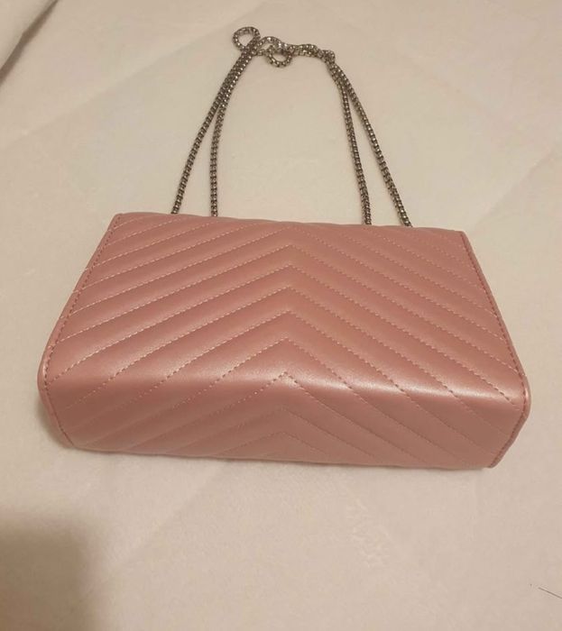 Mala tira colo rosa bebé