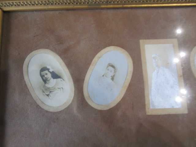 moldura antiga madeira com fotos de família