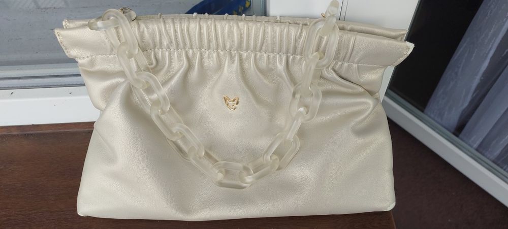 Złota torebka Fremestage