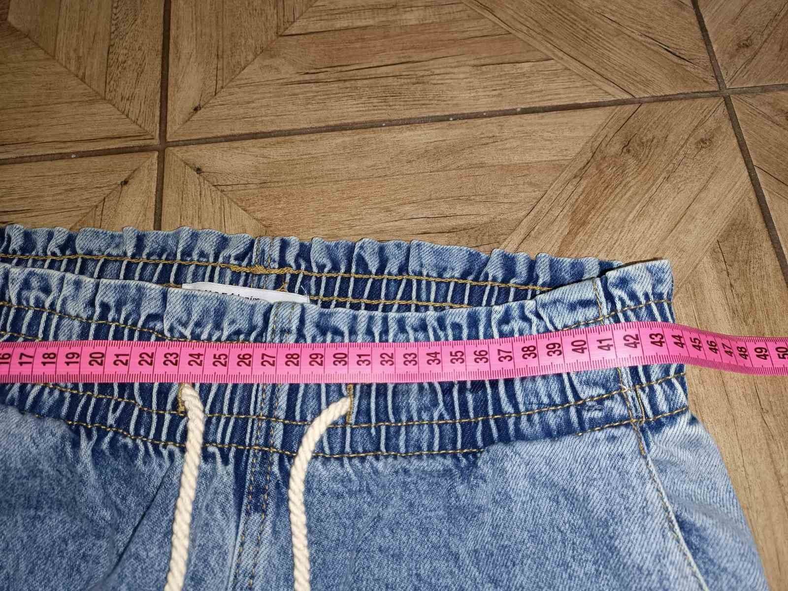 Фирменные джинсы 44 размера