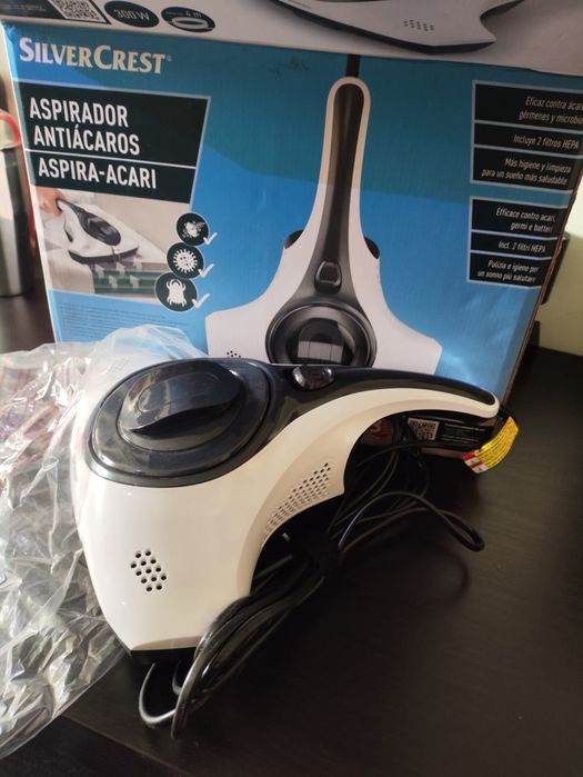 Aspirador anti-ácaros