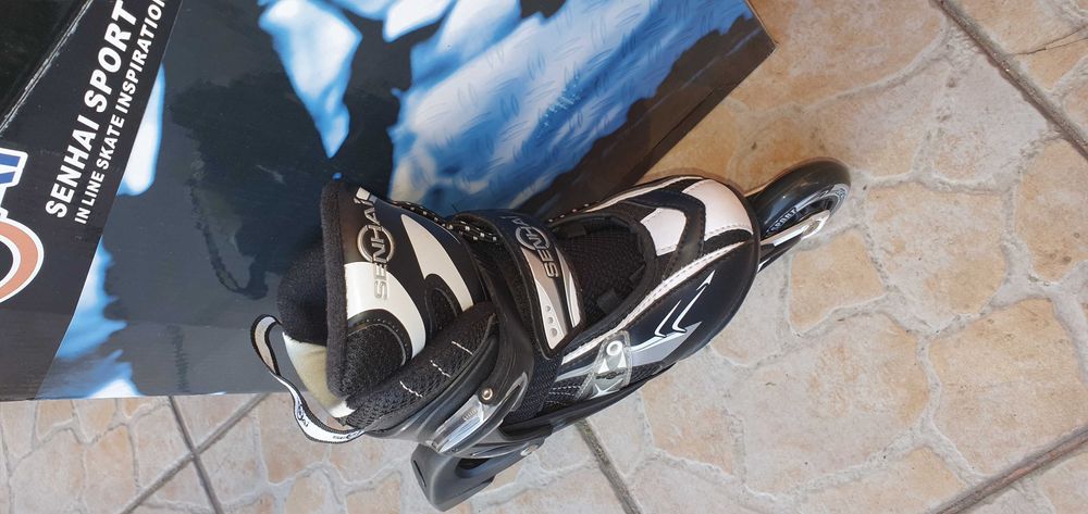 Nowe Łyżworolki rolki regulowane Senhai PW-125F czarne S 32-35 ABEC-7