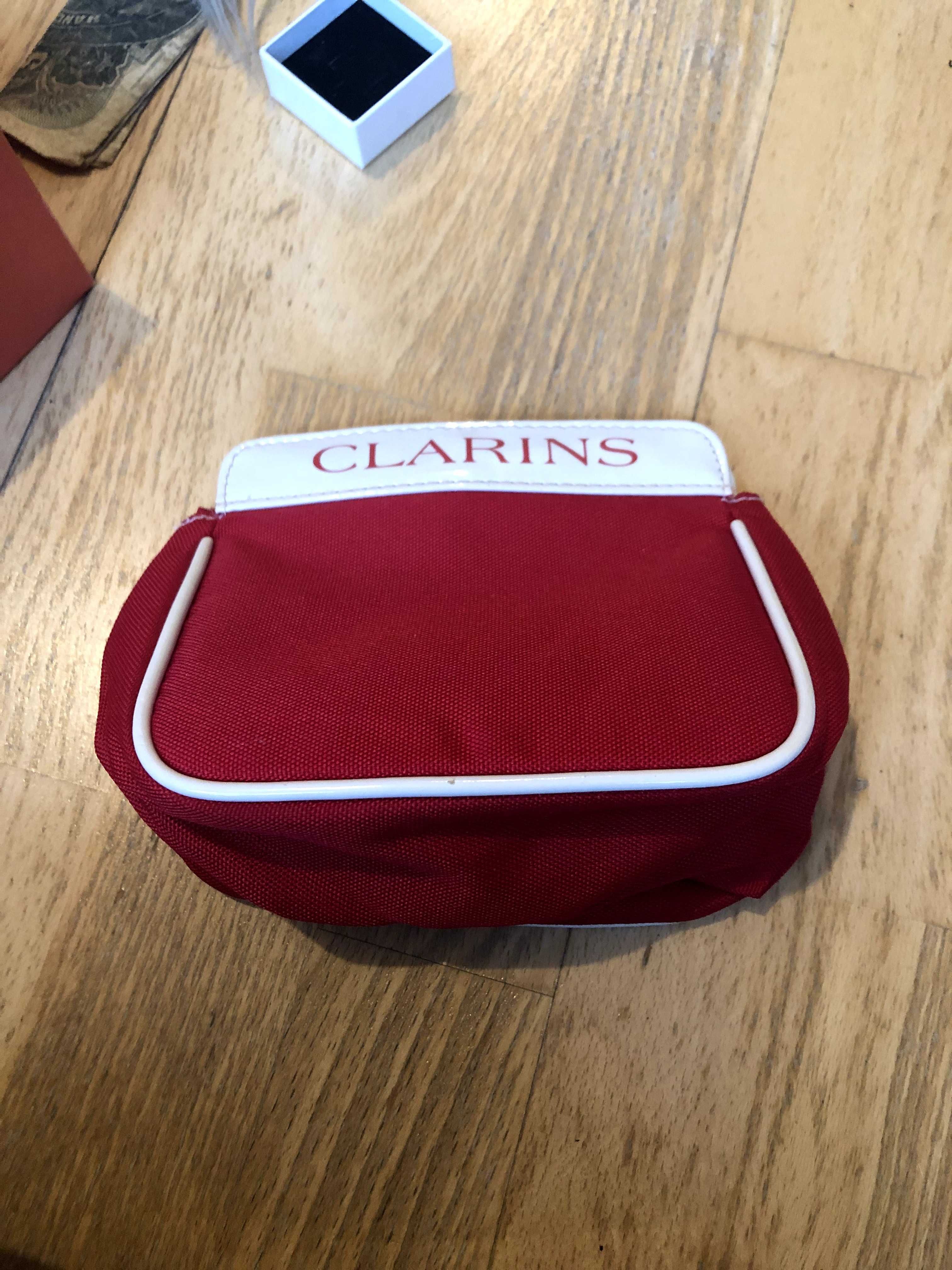 bolsa vermelha clarins
