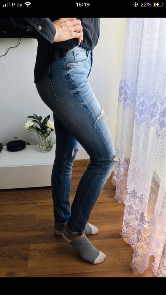 spodnie z dziurami przetarciami jeansy S 36