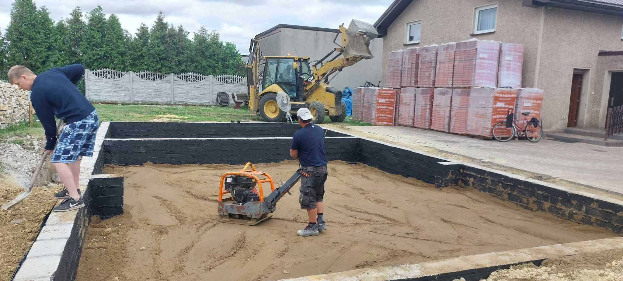 wykop pod fundamenty domu Koparko Ładowarką koparka kołowa młot