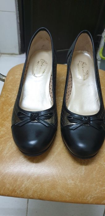 Sapatos em pele