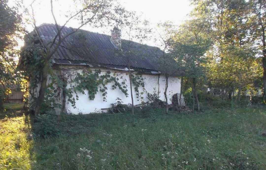 Продається земля 6 сот з будинком 20 м2  у с. Підлісся
