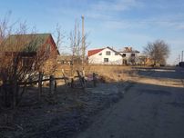 Будиночок зі зрубу та земельна ділянка 15 сот. с. Забужжя