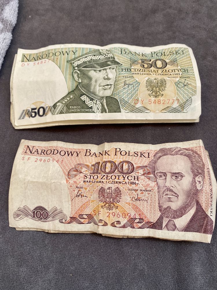 Stare banknoty 50 i 100 złotych.