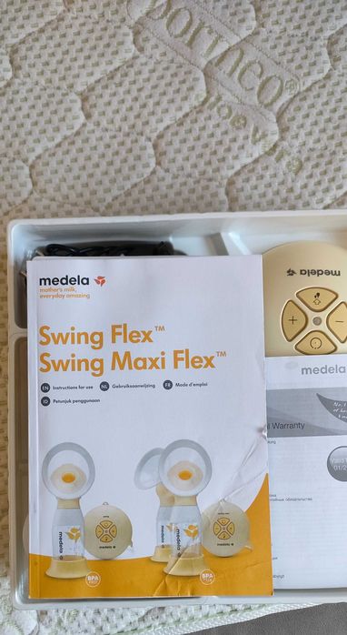 Laktator elektryczny Medela swing flex+butelka medela calma +akcesoria