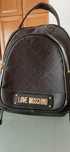 Carteiras e mochilas de marca original