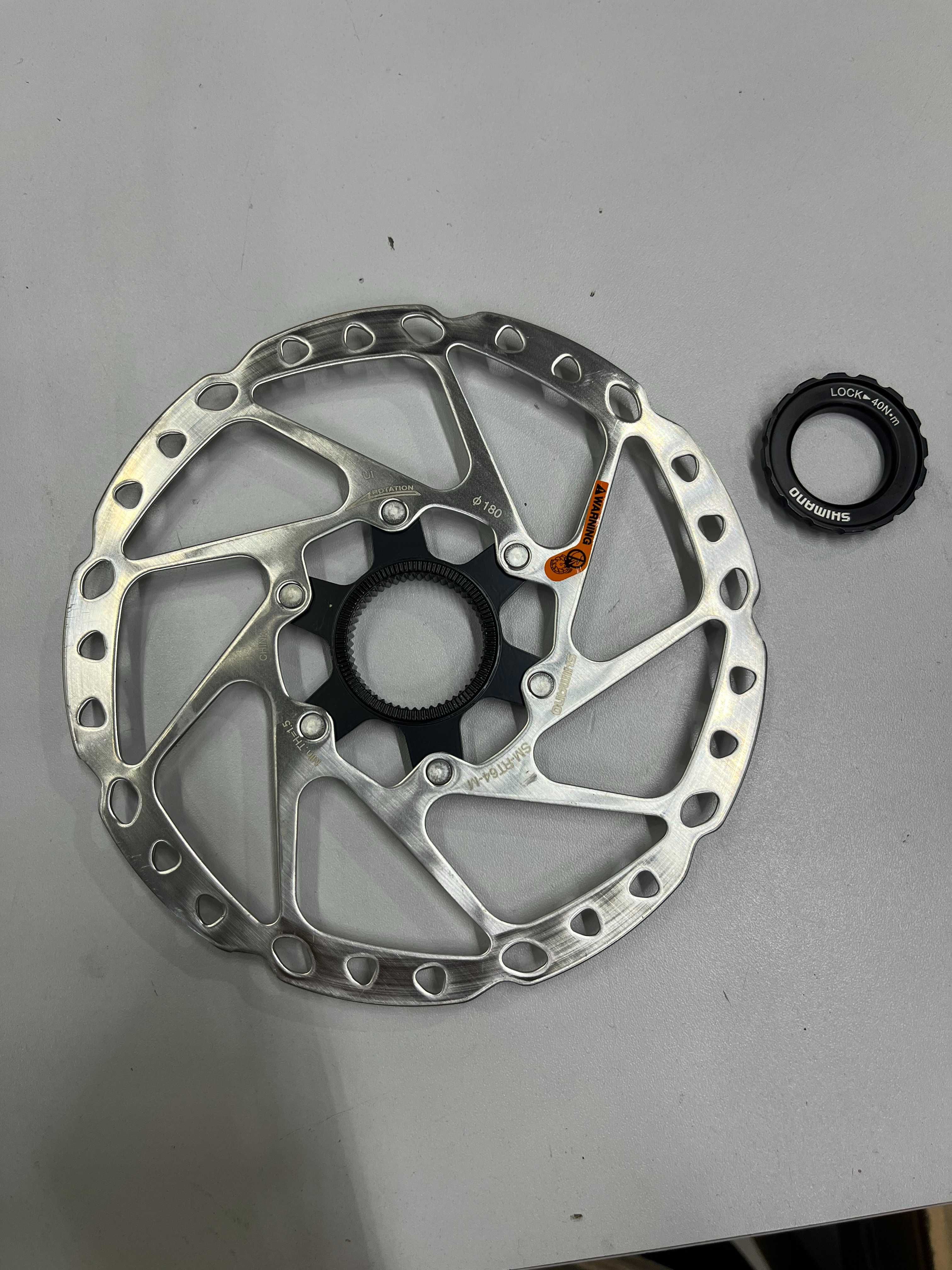 Tarcza hamulcowa Shimano RT-64 CENTERLOCK 180mm ZDJĘTA Z NOWEGO ROWERU