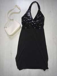 Sylwestrowa czarna sukienka ze zdobionymi plecami