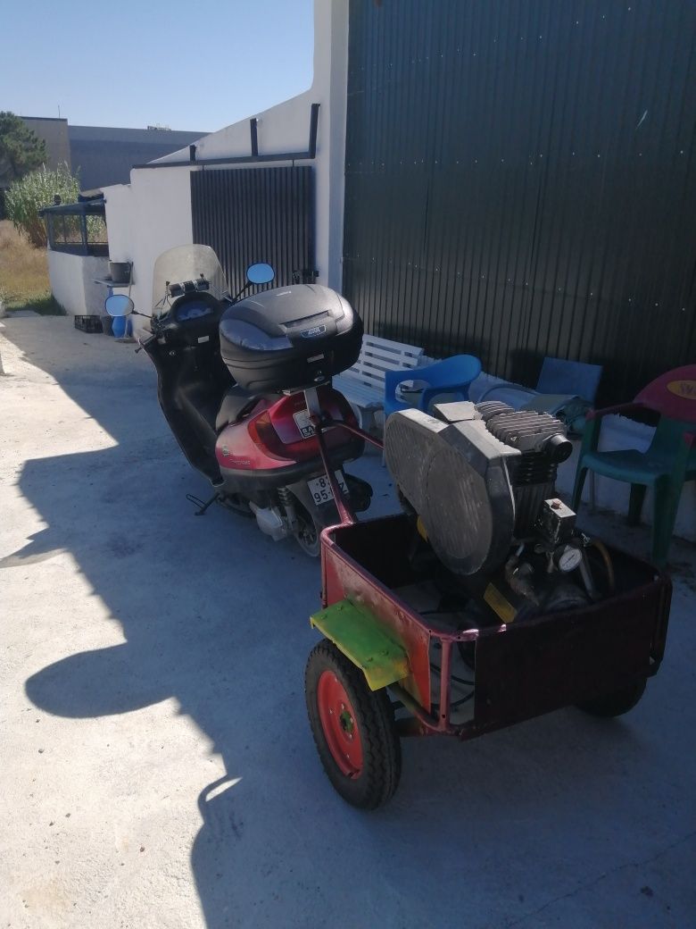 Honda 250 com reboque
