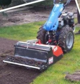 Usługi ogrodnicze wertykulacja glebogryzarka sianie trawy itp