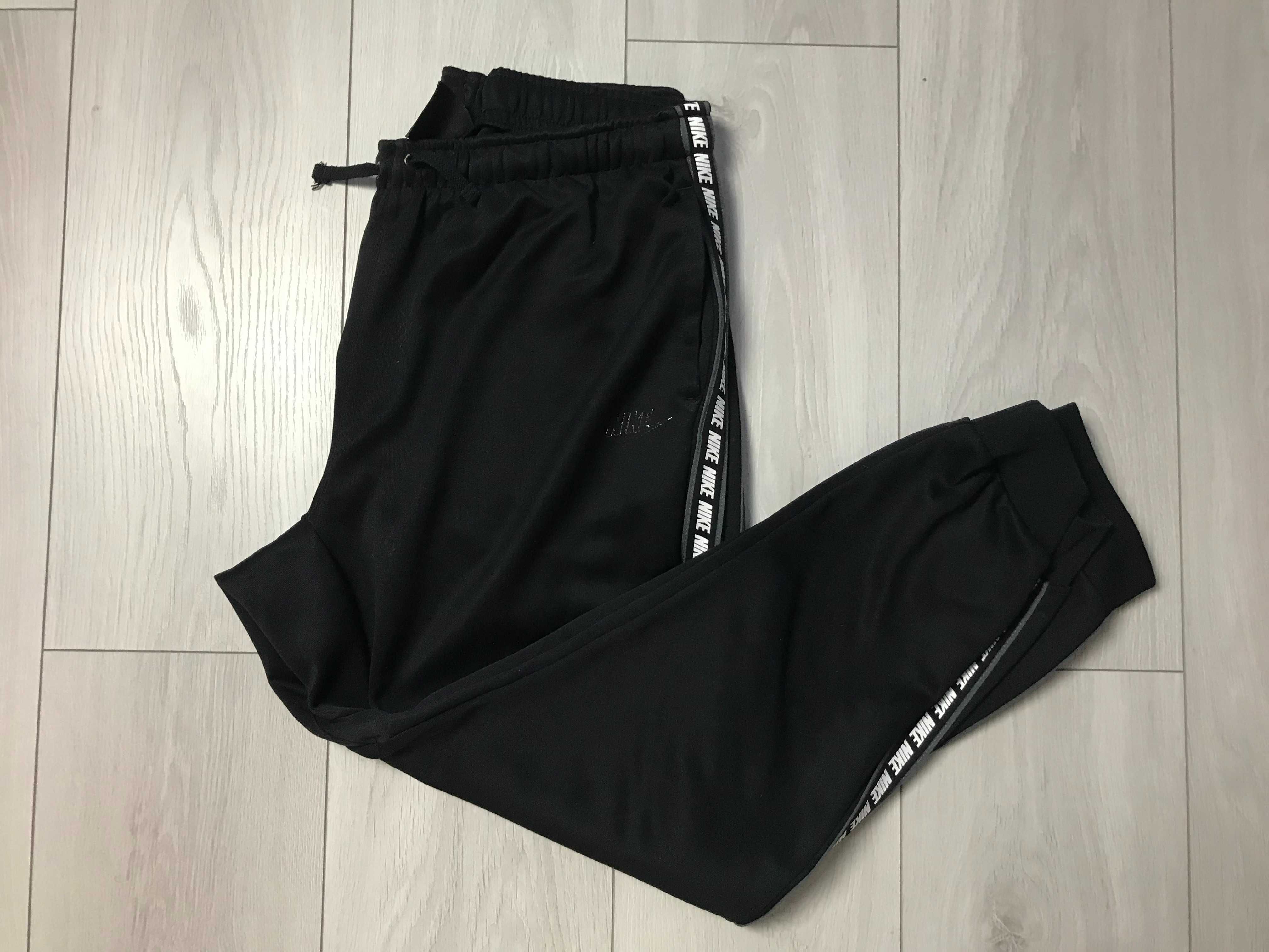 NIKE r.L oryginalne spodnie sportowe męskie