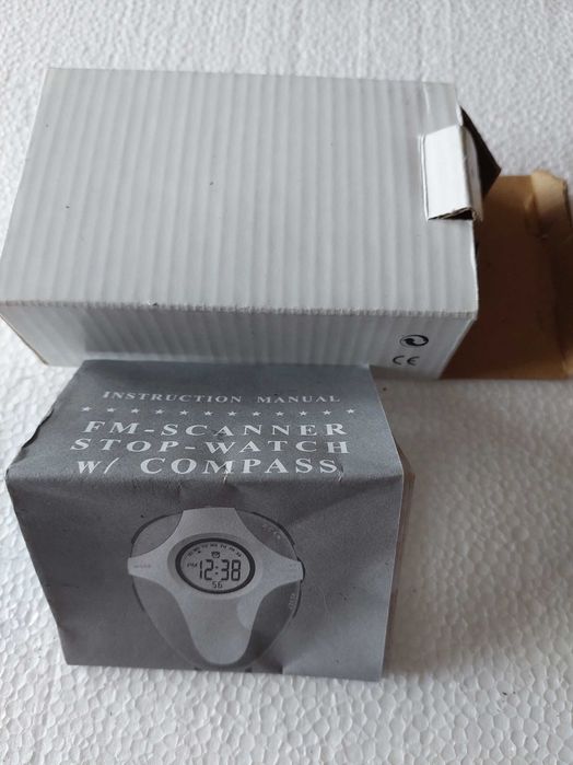 Bússola com Relógio