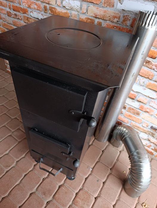 Piec kominek ogrzewacz pomieszczeń Szamociak rura kolana