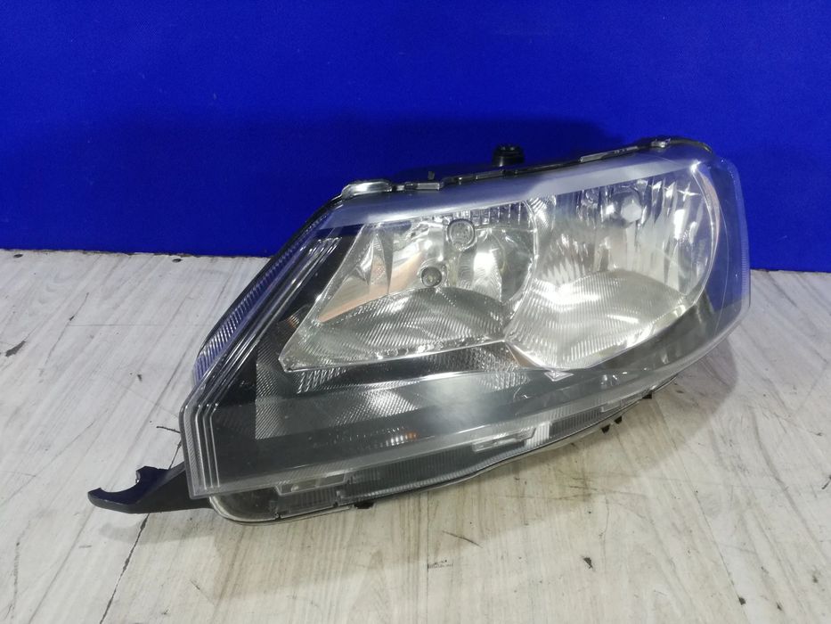 Skoda Rapid lampa reflektor lewa H7 Anglik 5JC 941 015 2010/2018