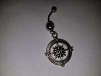 piercing com bussola - novo