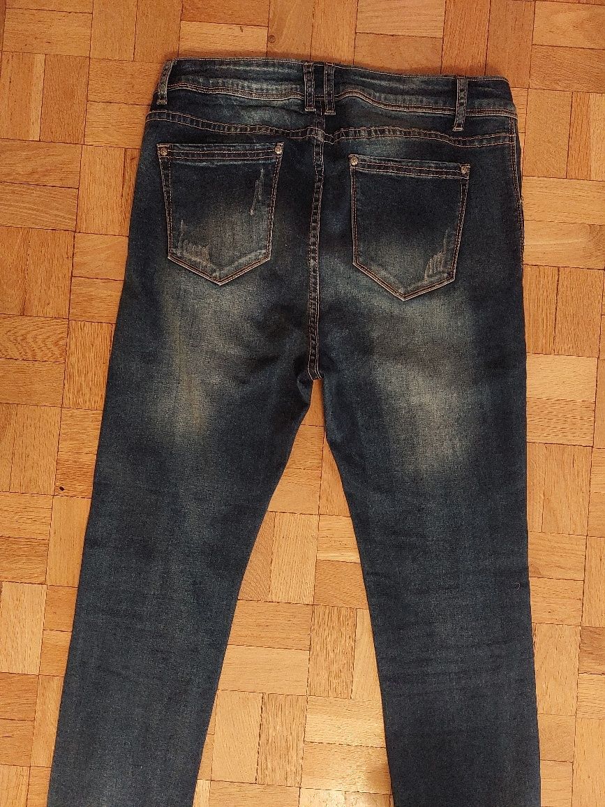 Spodnie jeansowe Mozzaar rozm. 2XL