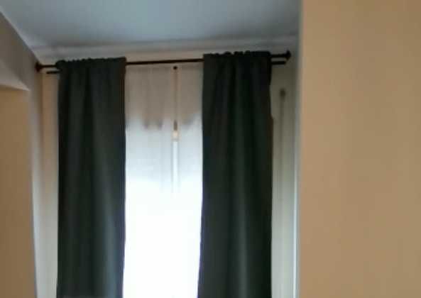 Conjunto de cortinas verdes e respectivos acessórios