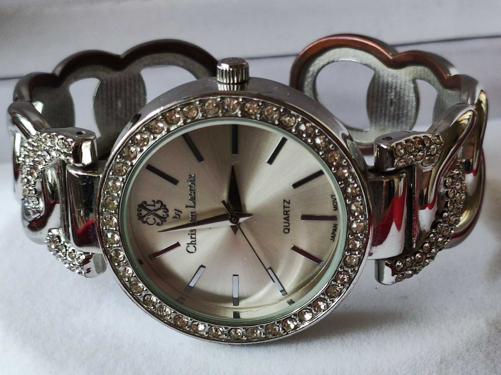 Sprzedam śliczny zegarek z cyrkoniami firmy Christiana Lacroix.