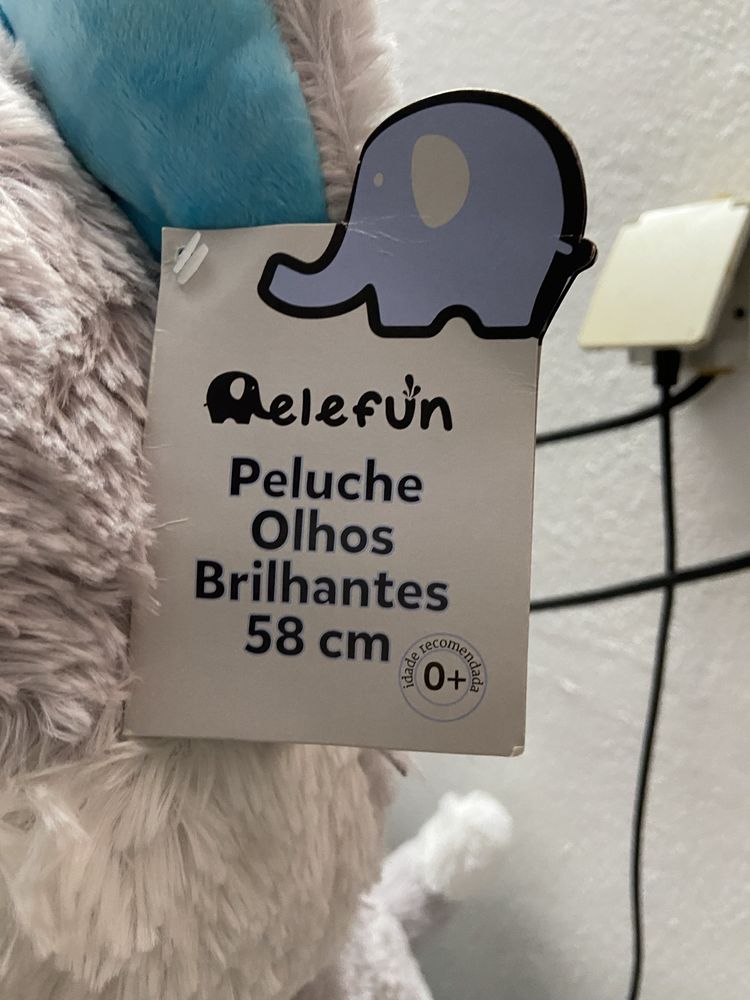 Peluche dis olhos brilhantes de 58 cm