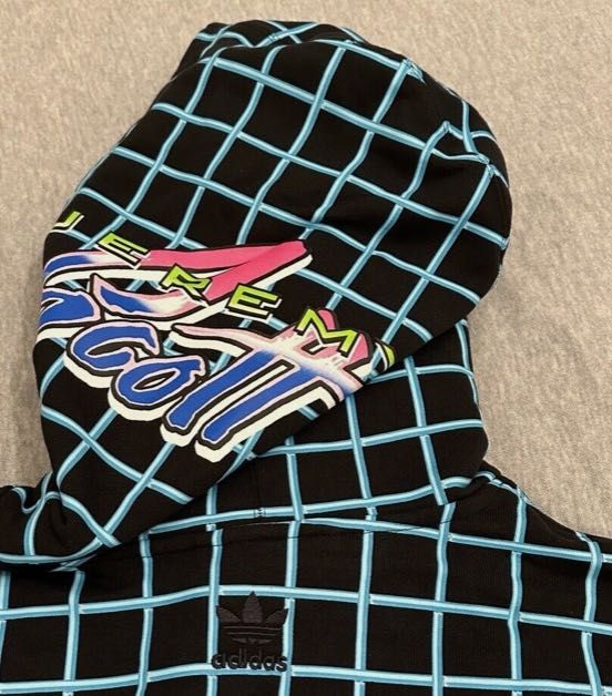 Sprzedam białą bluzę Adidas x Jeremy Scott w rozmiarze XL.