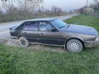 Мазда 626 GLX , 2 литра бензин , карбюратор