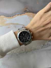 Женские наручные часы Rolex.