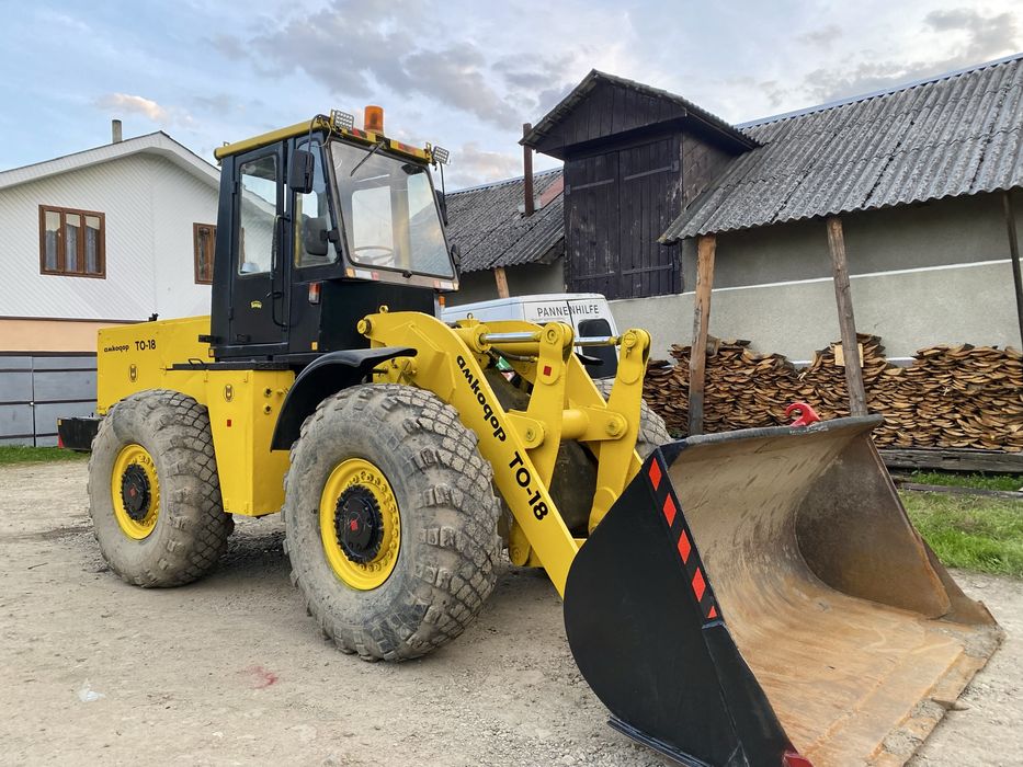 Амкадор ТО-18 навантажувач