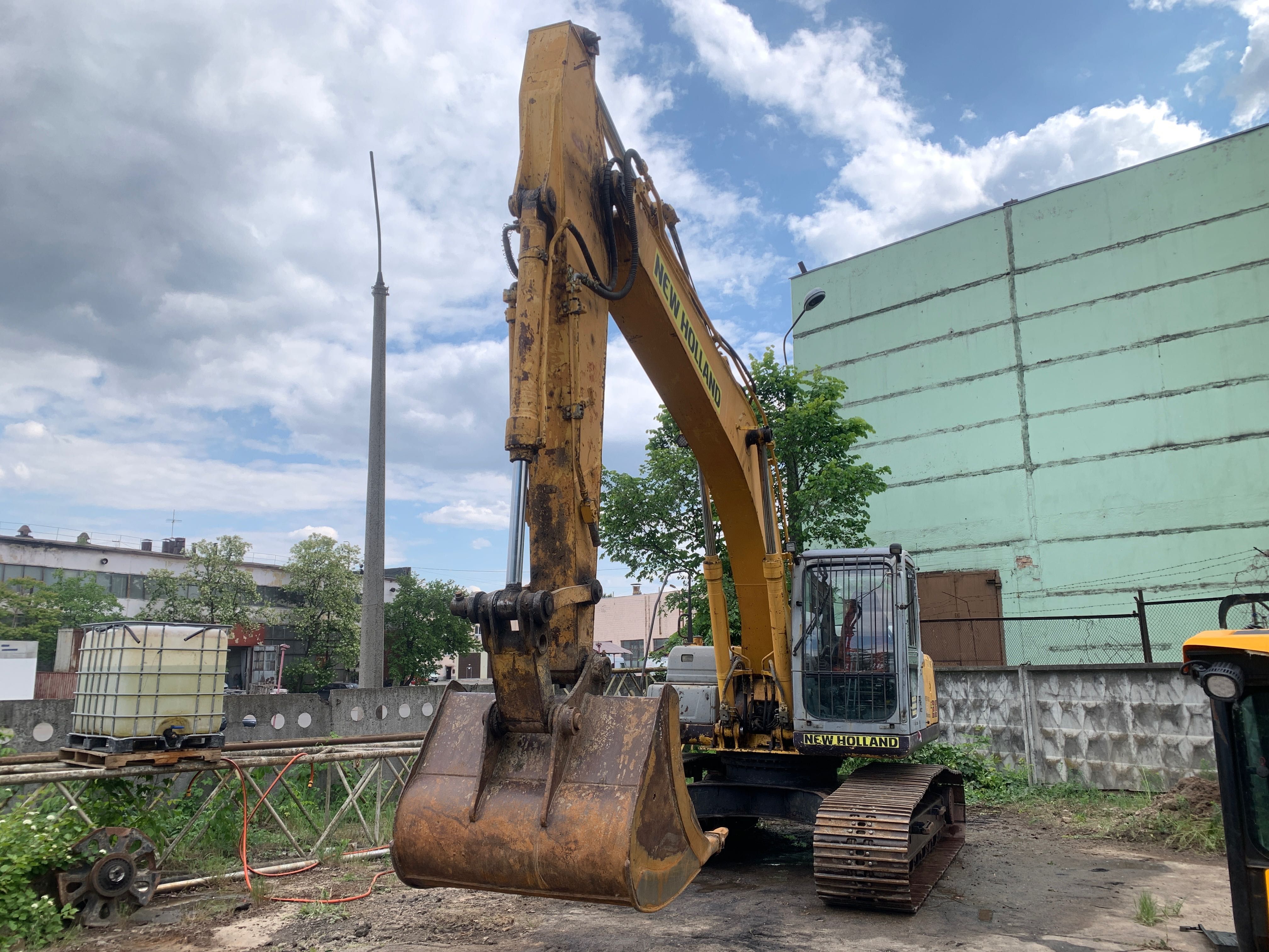 Гусеничний екскаватор NEW HOLLAND E215 Гусеничный экскаватор