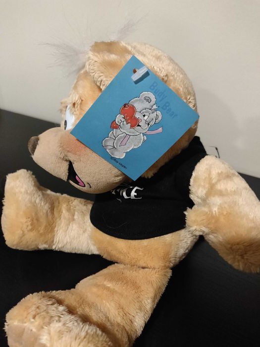 Ursinho de peluche com mensagem "Je t'aime"