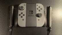 Joycons Originais Switch + Grip + strap