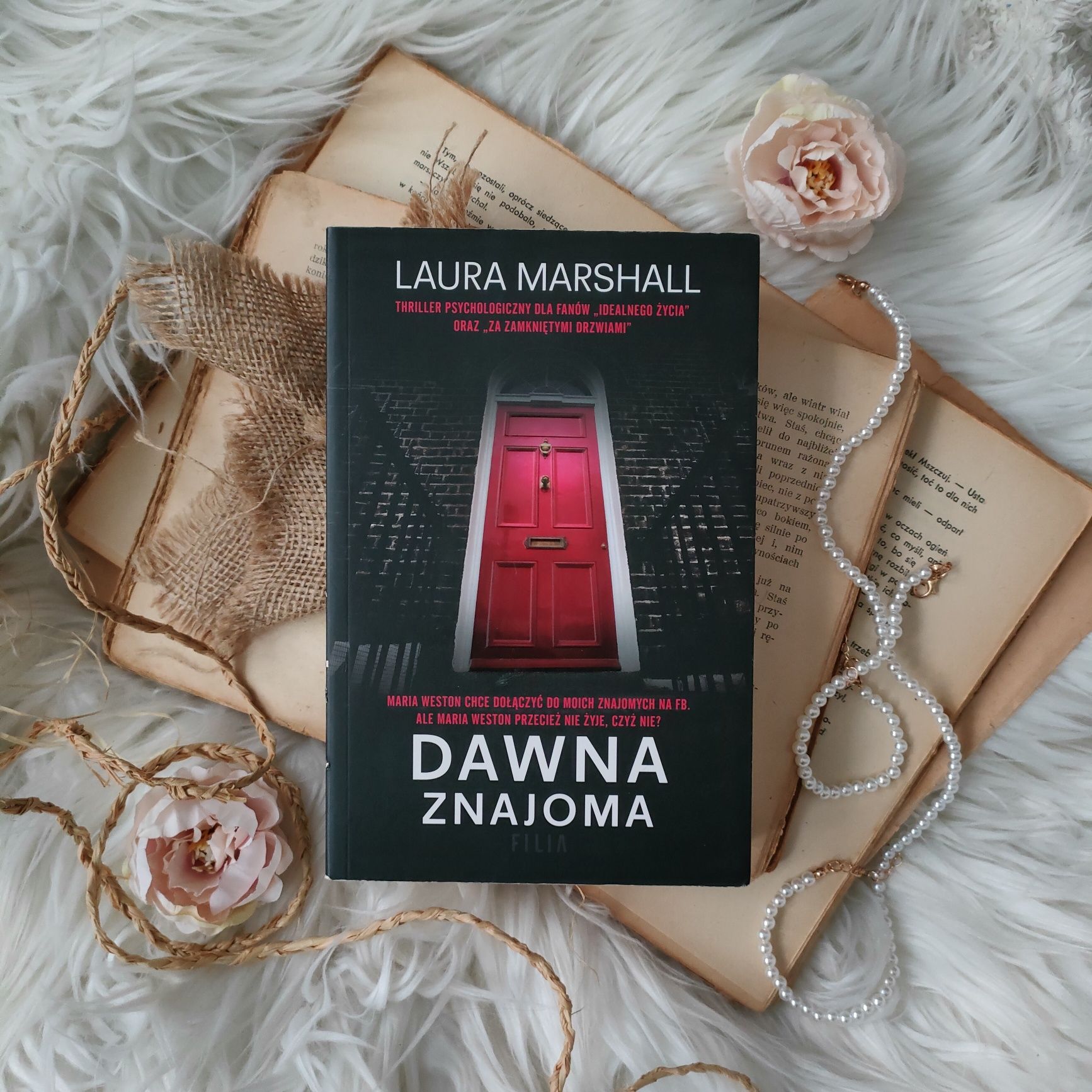 "Dawna znajoma" ~ Laura Marshall
