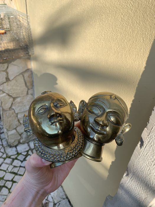 Brass god heads antique