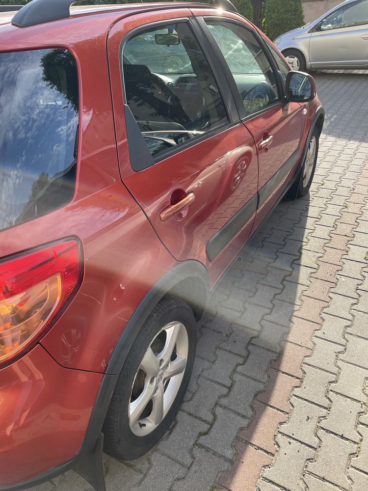 Suzuki Sx4 czerwony