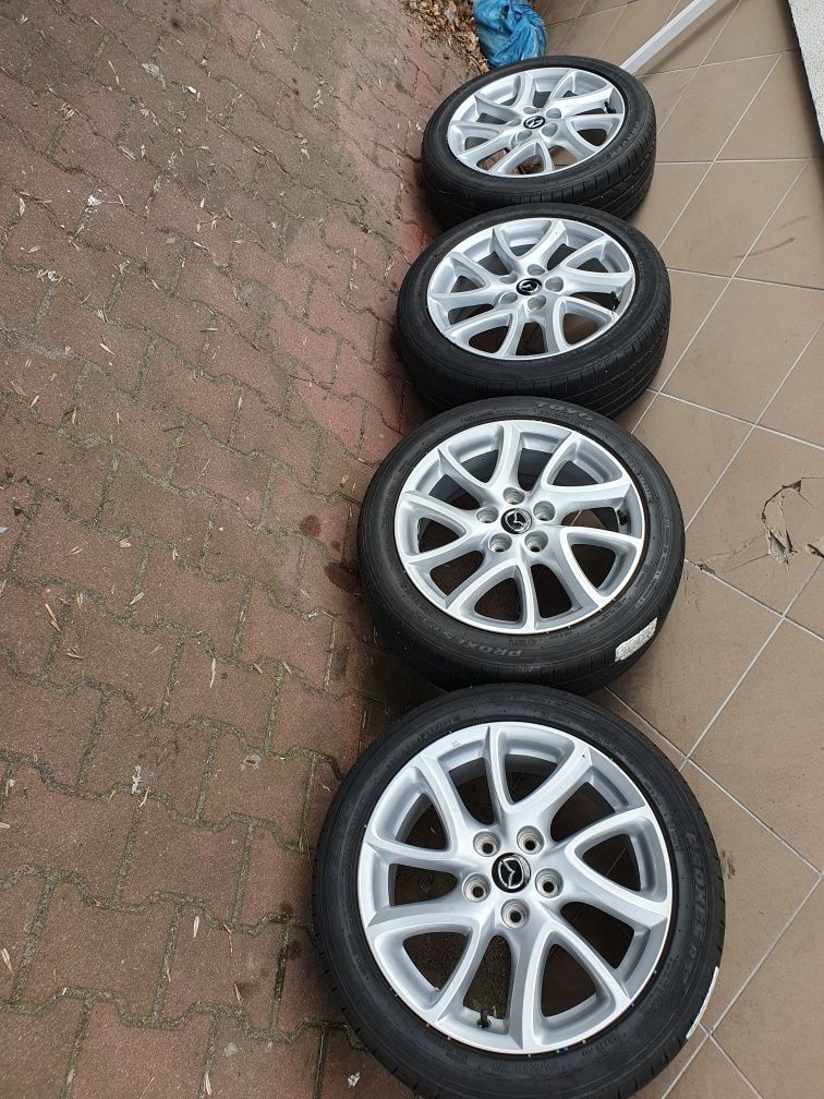 Oryginalne Felgi 17" Mazda 5x114.3 Et52.5 +205.50.17 Letnie