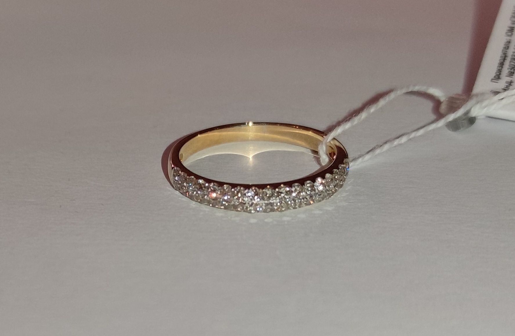 Жіноче золоте кільце з діамантами 0,56 карат 18 мм. Жовте золото. Нове