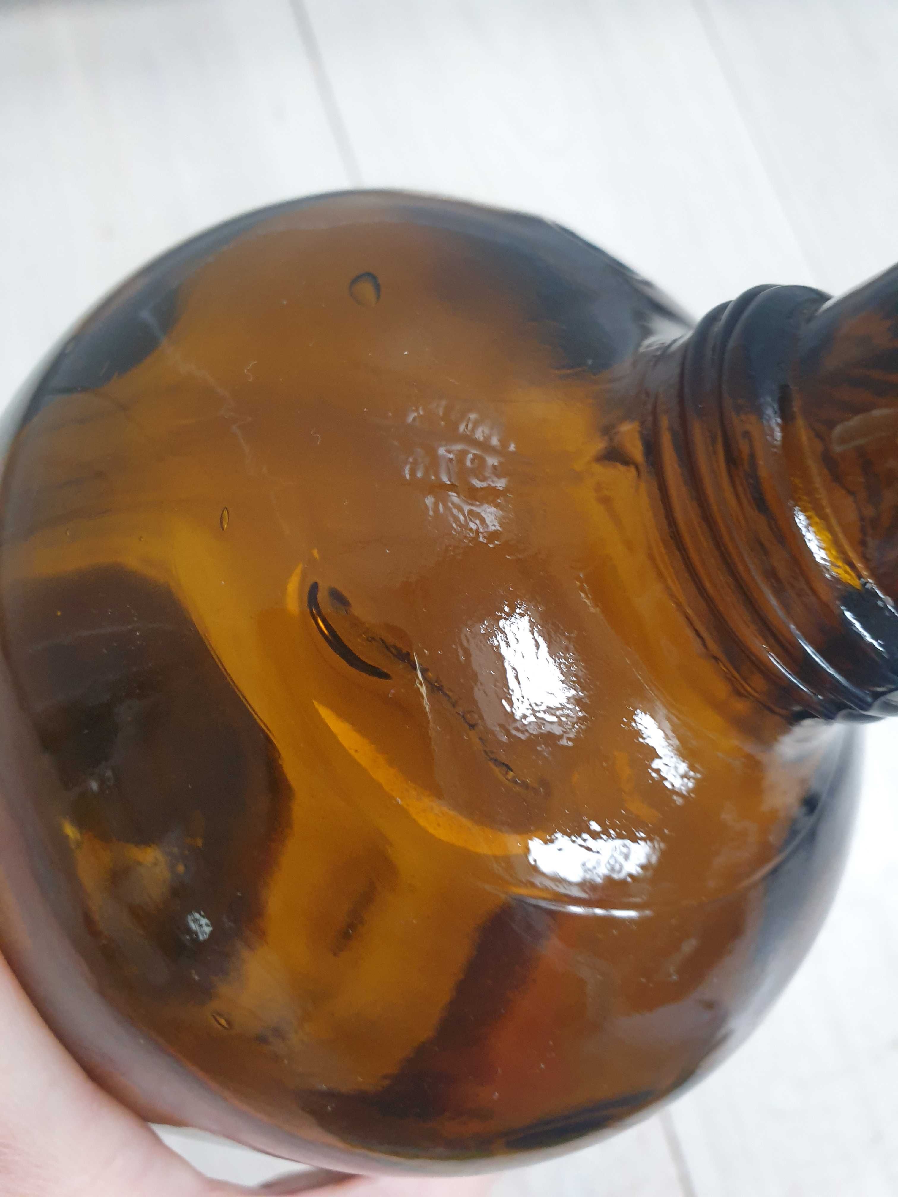 Stara duża butelka aptekarska apteczna z brązowego miodowego szkła
