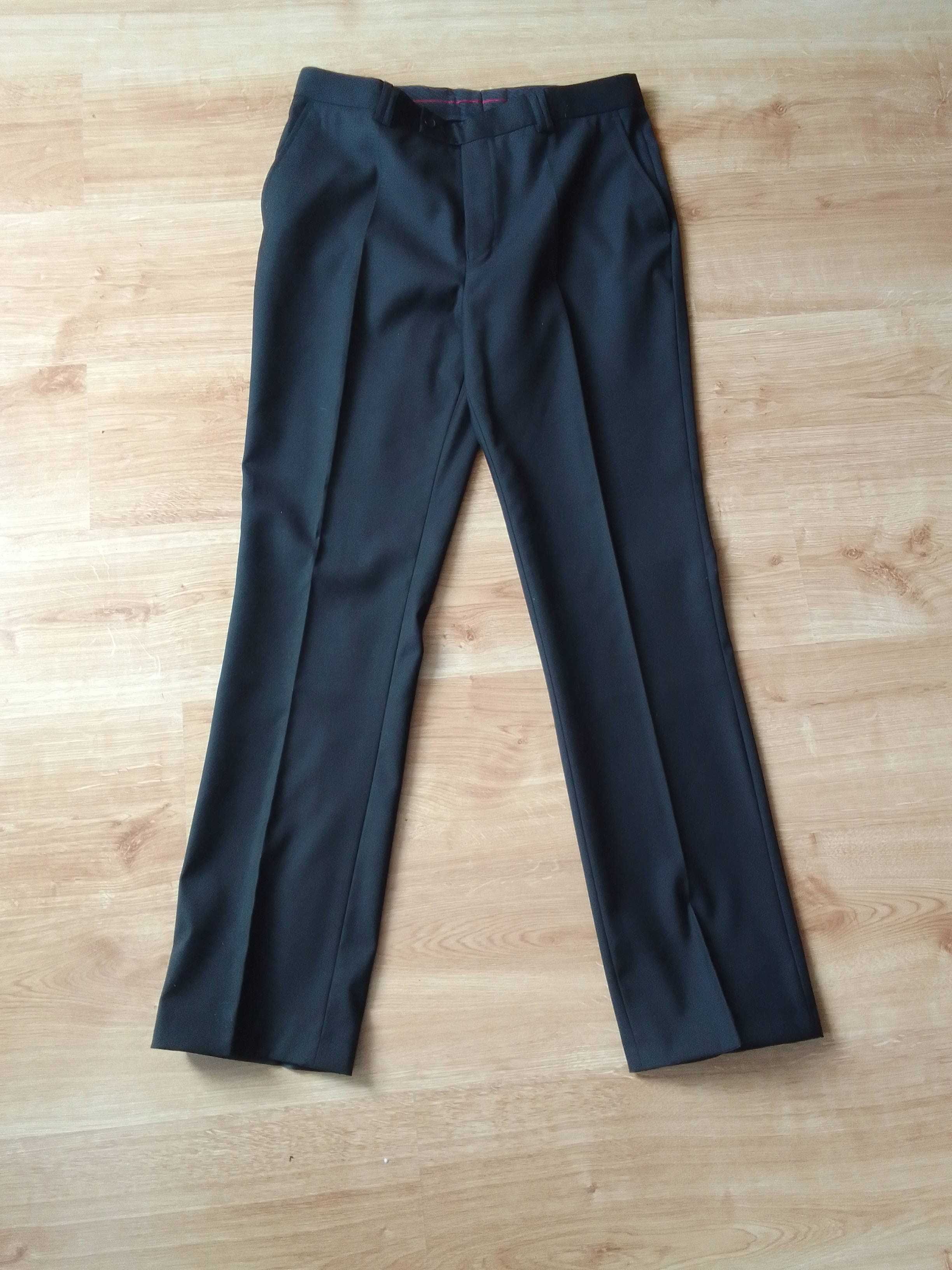 Spodnie męskie czarne garniturowe rozm. 176/88 . L