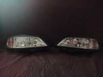 Lampy przednie Opel Astra G