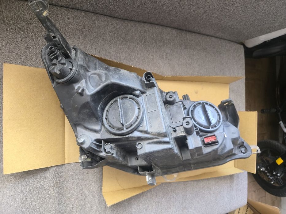 Farol Opel Astra 2011