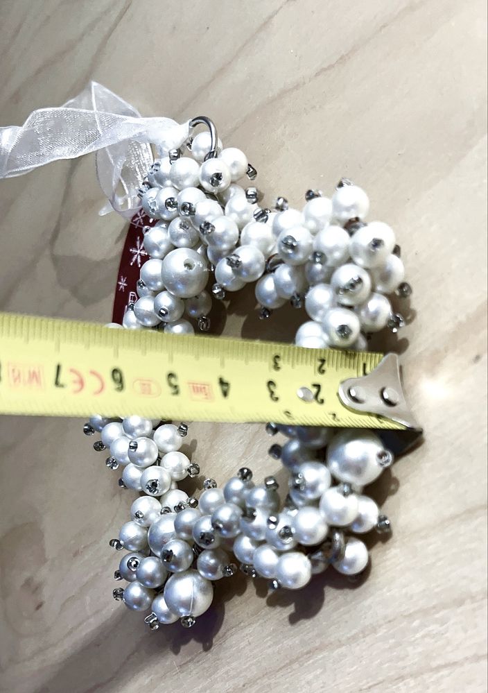 Estrela devirativa de natal em perolas e metal