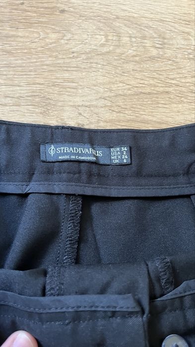 Calças de tecido pretas